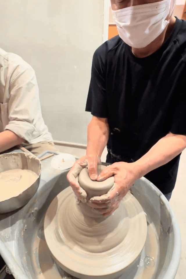 Guest at the wheel with the master alongside