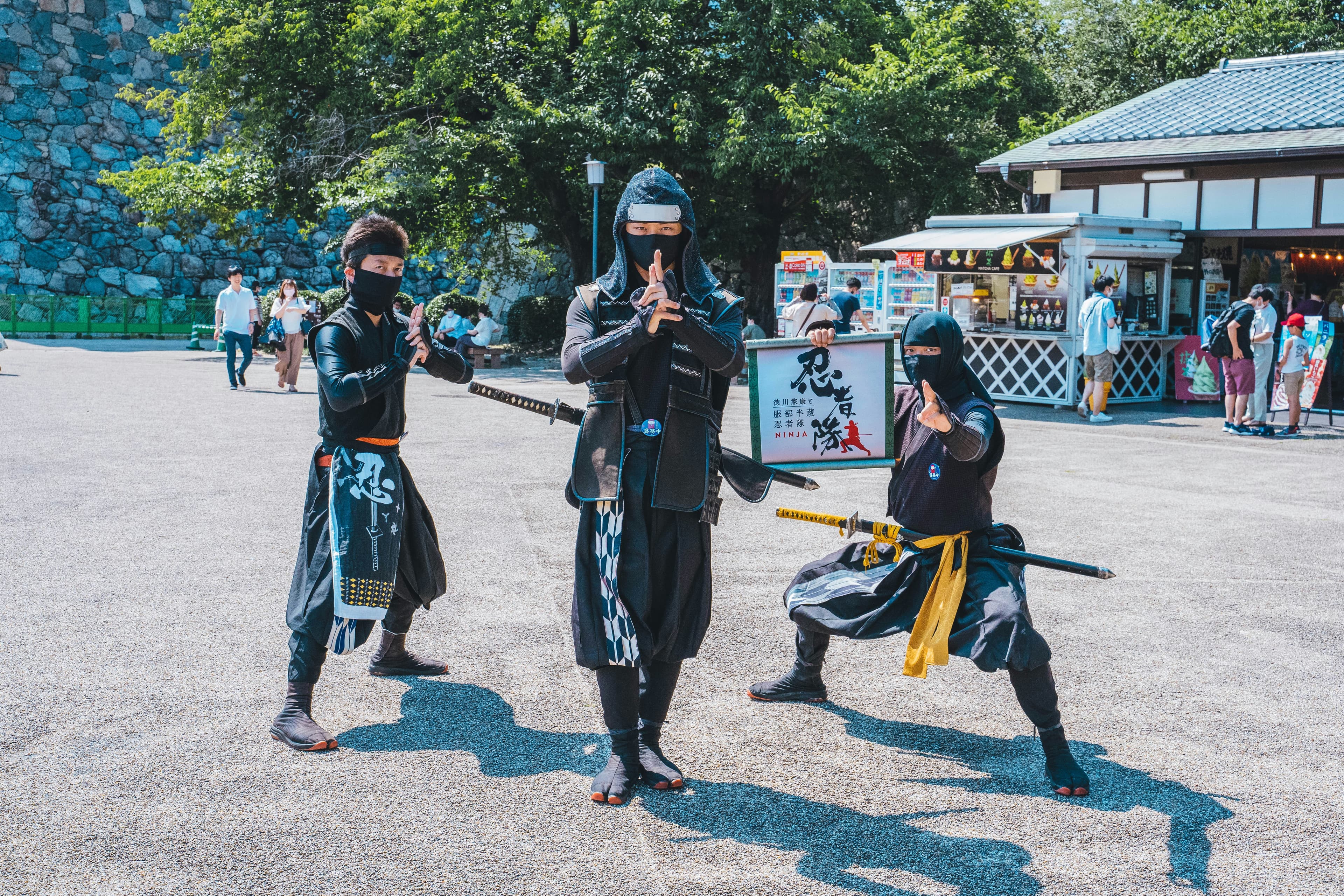 Guest practising shuriken throwing at a wooden target