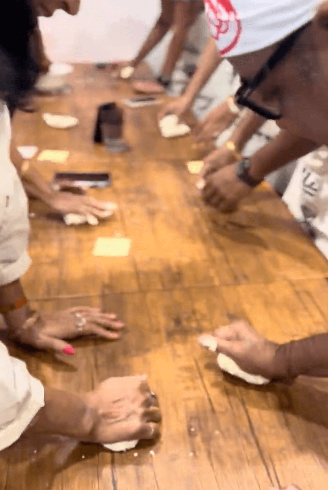 Fresh noodle dough being stretched